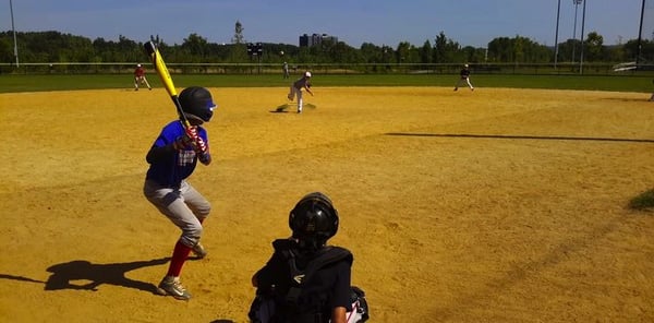 An outdoor summer baseball camp.