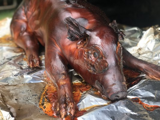 Such care and love goes into each pig roast we serve!