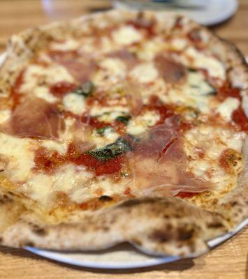 Margherita $15 Tomato sauce, housemade mozzarella, good olive oil, (added prosciutto)