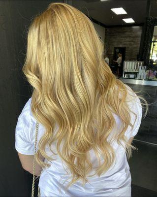 Tape in hair extensions for length.