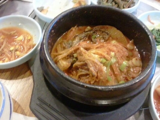 Mackeral wrapped in Korean spicy cabbage in a hot stone pot... Yummmmmm: