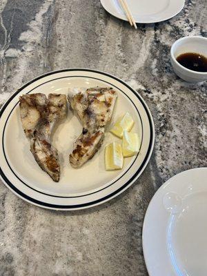 Hamachi (grilled yellowtail collar) with ponzu-thin soy dipping sauce)