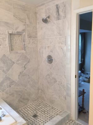 Job. Battalia. Complete bathroom - shower renovation with marble tile.