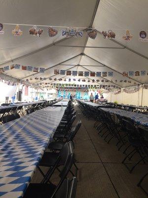 I helped to set up chairs tables and hung the flags to this tent. You're welcome.