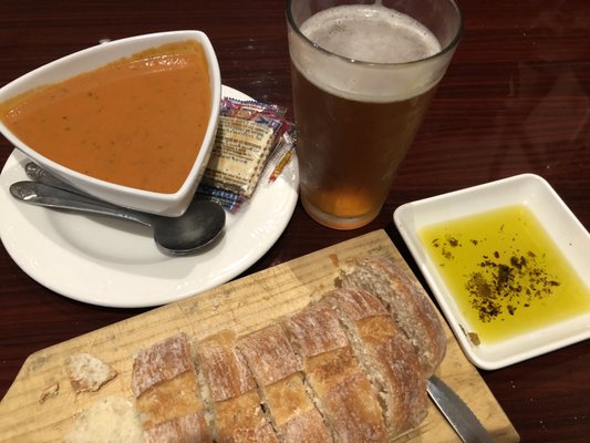 The bread was fresh and warm served with olive oil. We went for the seafood bisque and we made a good choice.