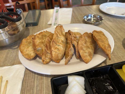 Fried dumpling and black bean noodles