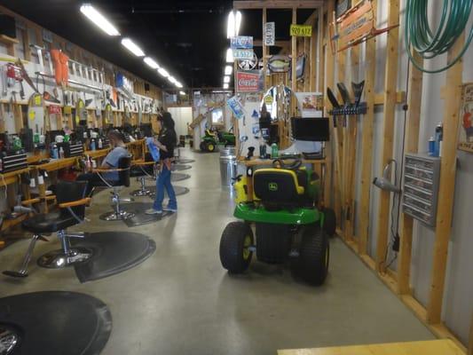 The owner went with a garage theme because he started out cutting his friends' hair in his garage.