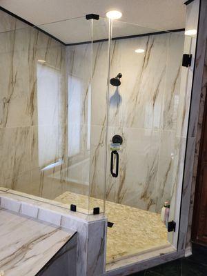 Huge walk in shower using large format tiles