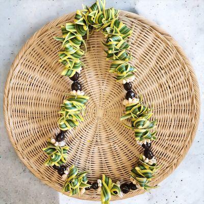 kukui nut with sea shell and leaf