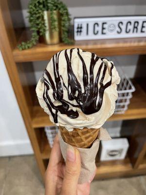 Peanut butter with hot fudge and a waffle cone