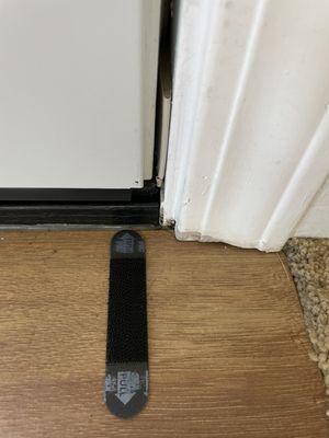 Black stuff collects at base of door