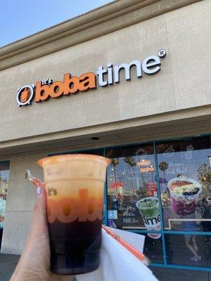 Thai iced tea with almond milk and boba.