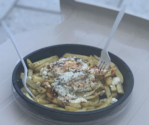 Greek fries!  Omg they were so good, everyone that say me walk by with them asked where they could get some fries like that