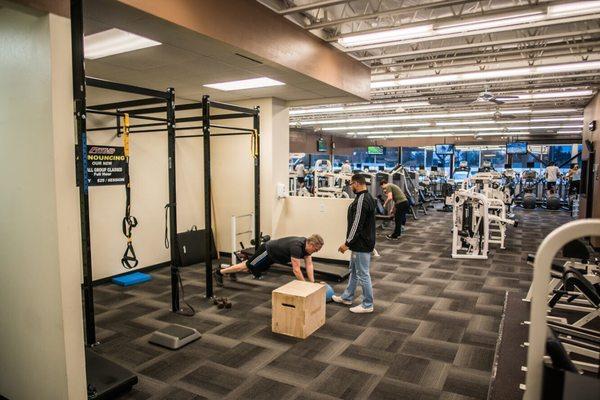 Personal trainer working with a member.