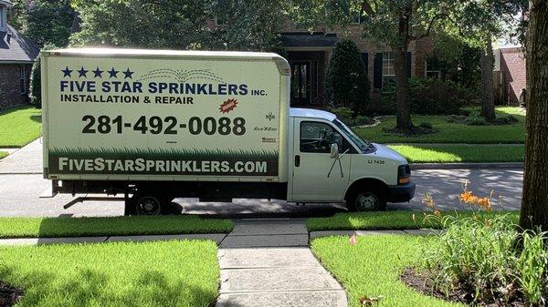 Five Star Sprinklers Service vehicle.