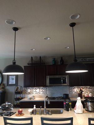 All pendant lighting and backsplash  with under lights done by Pete. Excellent work