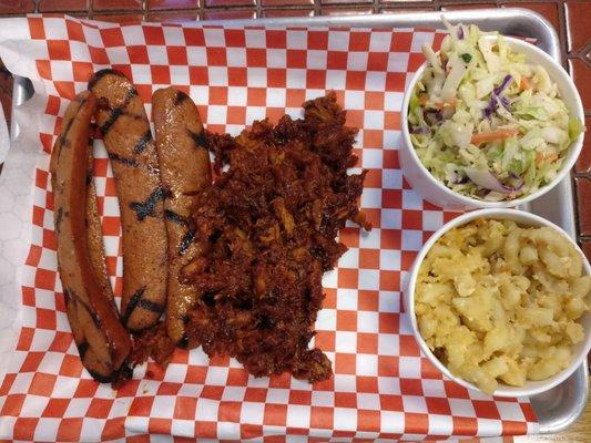 Plate option which includes two meat choices (pulled pork and sausage), 2 sides and a drink -$14