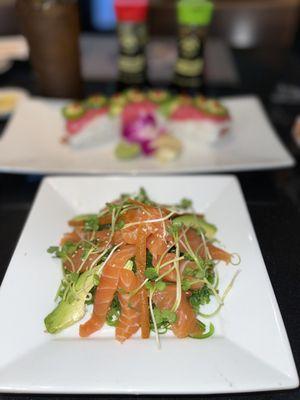 Seaweed salad w maki (salmon), masago, gobo sprouts and avocado.