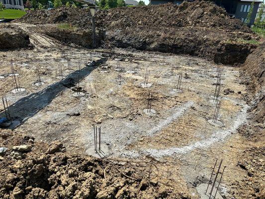 This is a photo from a pier inspection, also called a drill and fill. These are piers that are filled with concrete for a residential home.