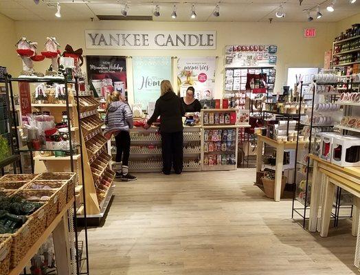 checkout counter at the rear of the store