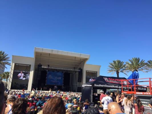 Free live music, tons of booths drinks, food, sunshine and you can hear it from the beach !