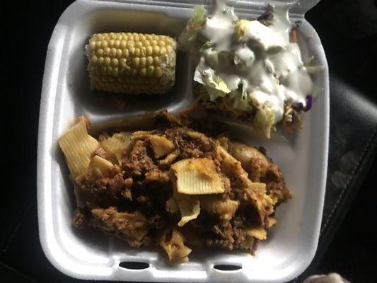 Stuffed shells, corn, and fresh salad