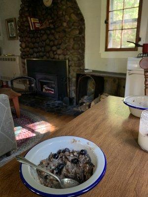 Blueberry Wild Rice Porridge next to the fire