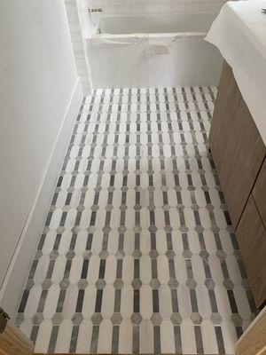 Tub floor tile installation