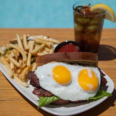 BELT - Signature Sandwich - Bacon, over-easy Eggs, Lettuce, Tomato, and mustard aioli.