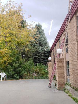 Ladders left unattended and some guy in the bushes.