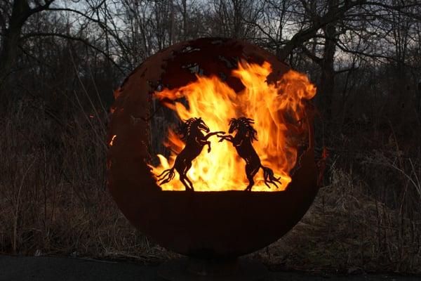 Wildfire - 37" Horse themed fire pit sphere by Melissa Crisp of The Fire Pit Gallery. https://www.thefirepitgal­lery.com