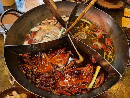 Three flavor hotpot: mild; mushroom; herbal