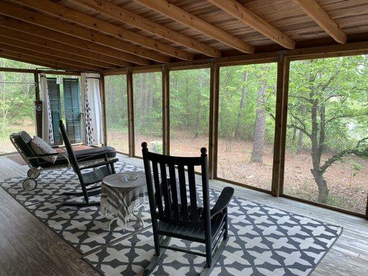 Our favorite place in the whole house. The screened porch. If you're quiet enough, you'll see some cool critters by the lake out here.