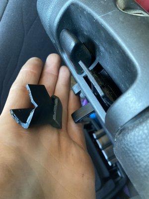 My broken center console handle