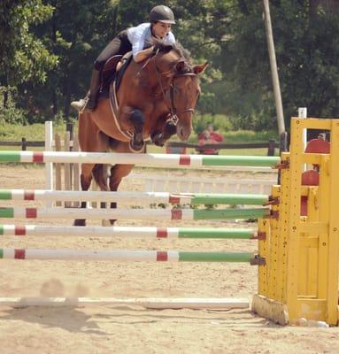 Brianna Jumping 5+ feet over the apple jack