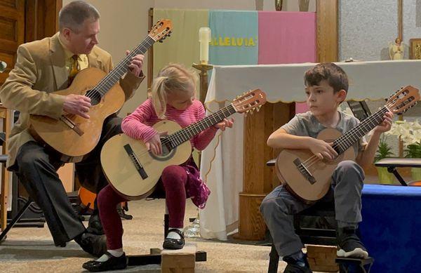 Playing at their first recital with Mr. Kevin, these two were so proud and so were their parents. #guitarparents #childbloom