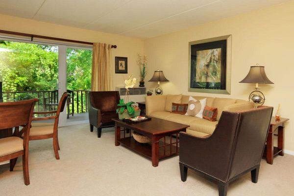 Spacious living room with private balcony.