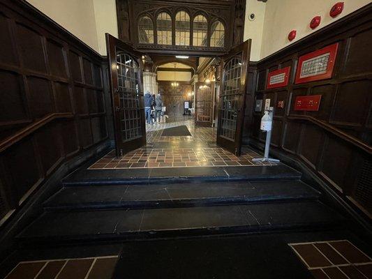 The very dark steps at the entrance to Noyes Hall.