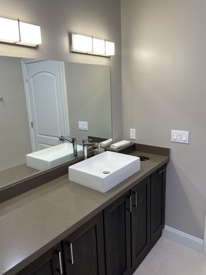 Large powder room with towel pedestal and discard hole