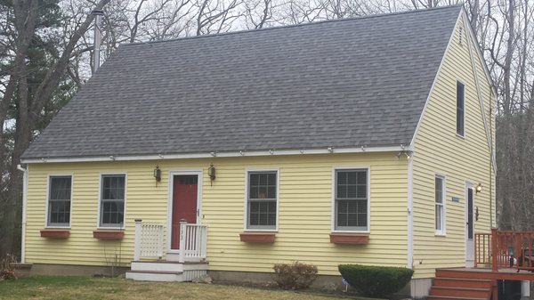 Classic Cape with big roof line in architectural shingles