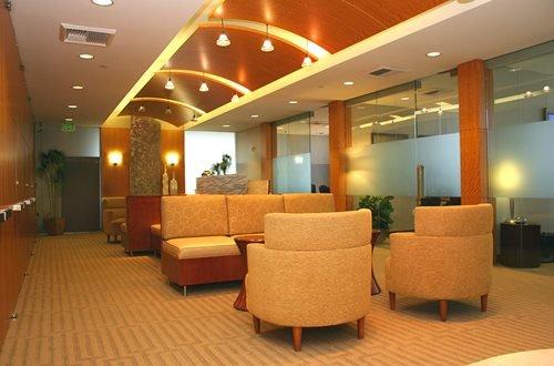 Comfortable and inviting waiting area with complimentary coffee and tea