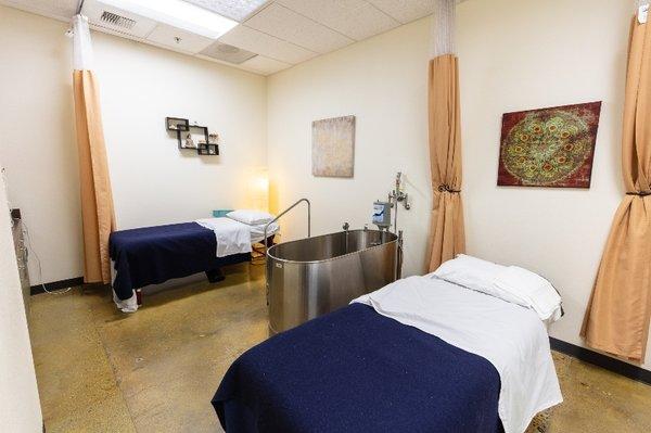 Hydrotherapy room including tub for peat mud baths and other treatments.