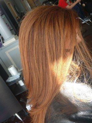 Red copper color with chocolate (warm) lowlights! Kelly did an amazing job!