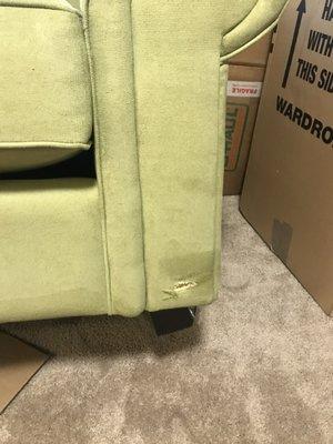 Chair torn to frame and stuffing