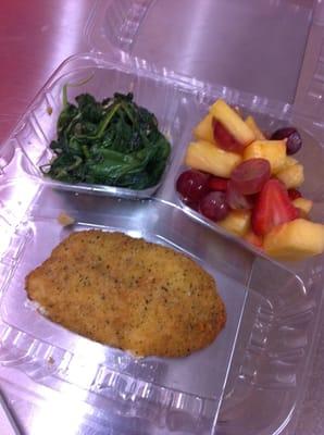 Parmesan crusted tilapia, garlic spinach and fresh fruits.