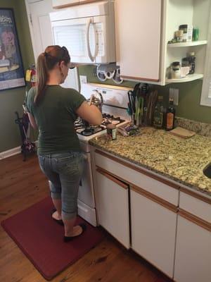 Heating a quick dinner in the community kitchen.  (Everyone is responsible for cleaning their own mess)