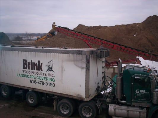 Loading a semiwith mulch