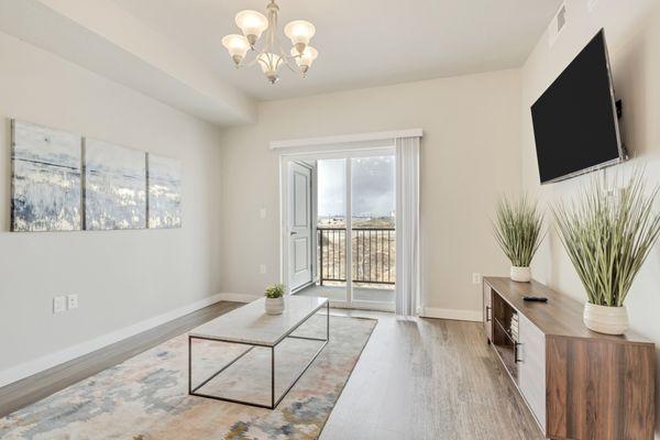 Living room area with private balcony