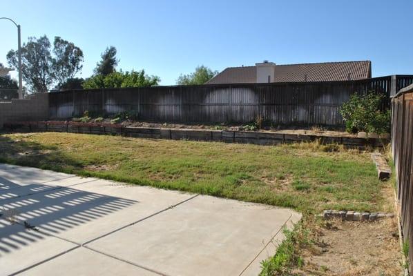 This is our backyard before Santiago rescued it!