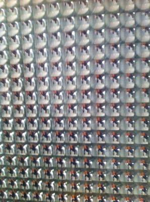 This is the glass tile wall in the bathroom. It is really cool because it inverts a tiny little image of you.